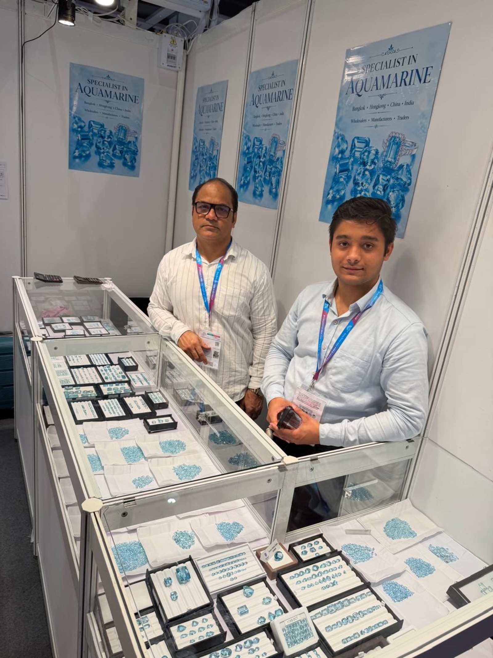 AB Thai Global Gems team at their trade fair booth, specialists in aquamarine